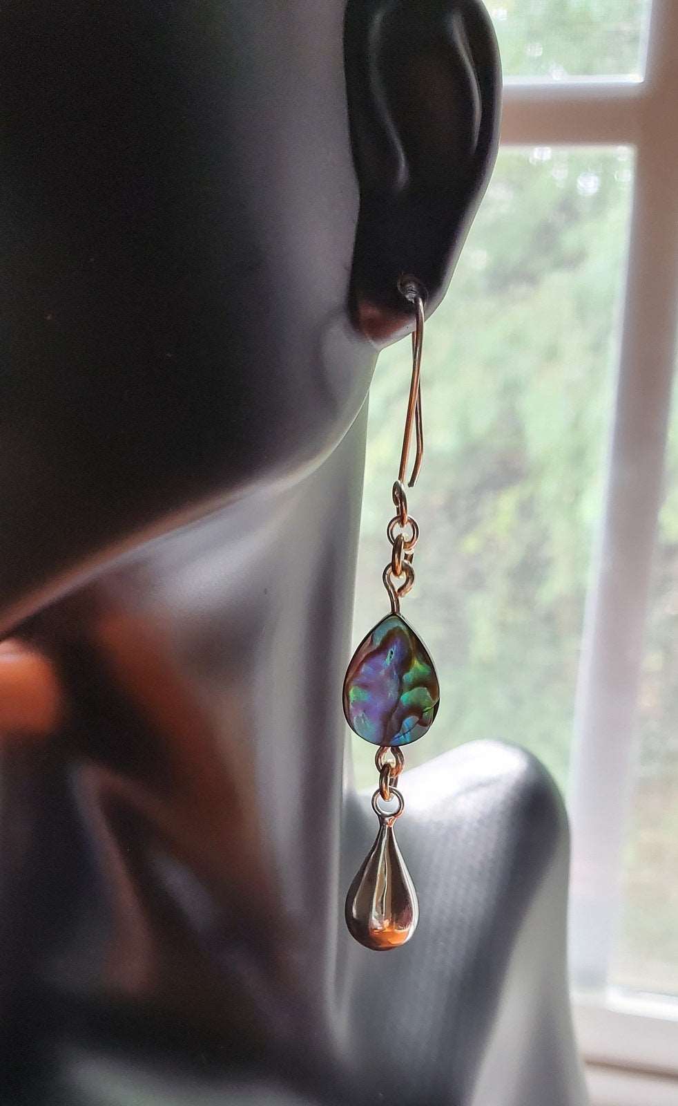Kayla Dangle Earrings on bust view, abalone design, handmade earrings, Jiana Deon earrings