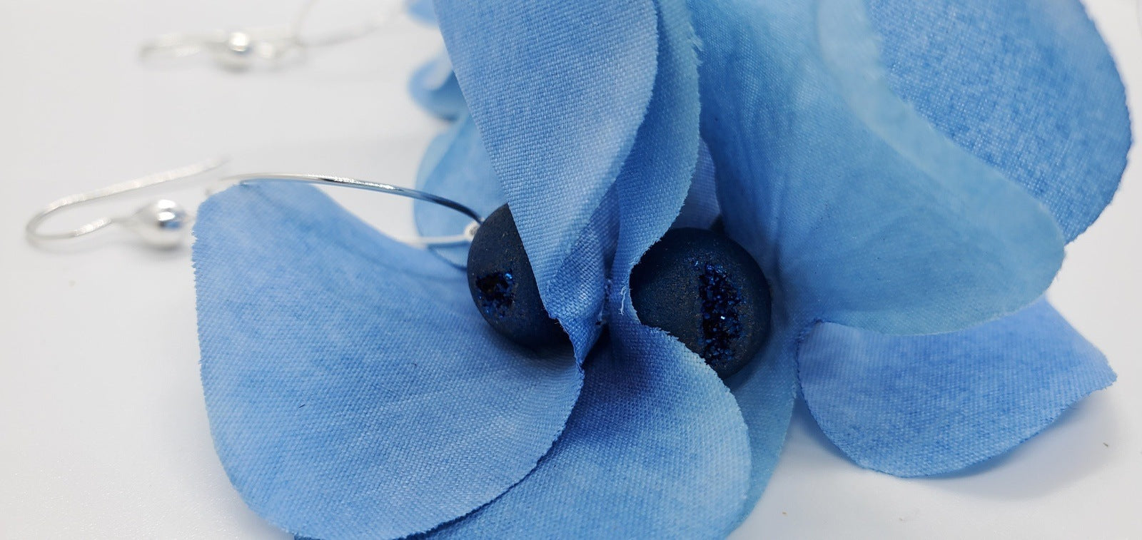 close up photo of Blue Petal Dangles, earrings by Jiana Deon, handmade earrings