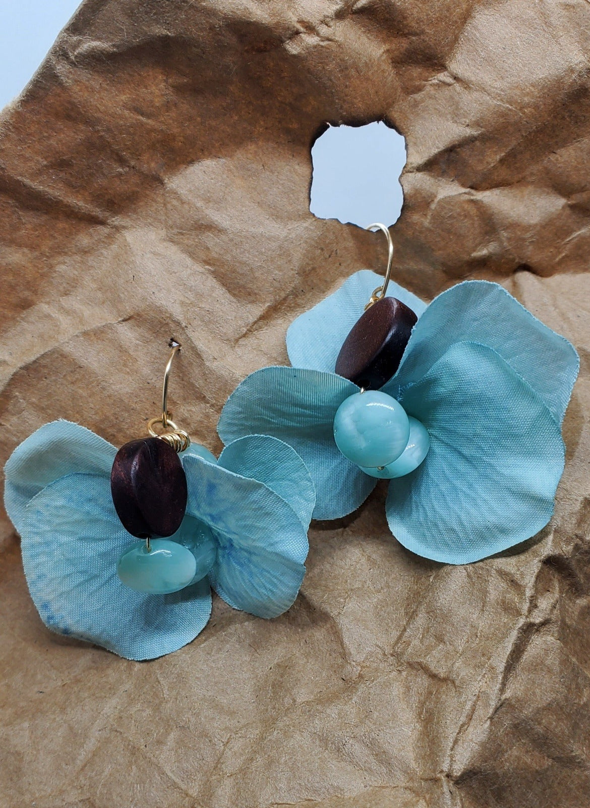 photo of Petal Mix Dangles on brown background, handmade earrings, earrings for women, handmade