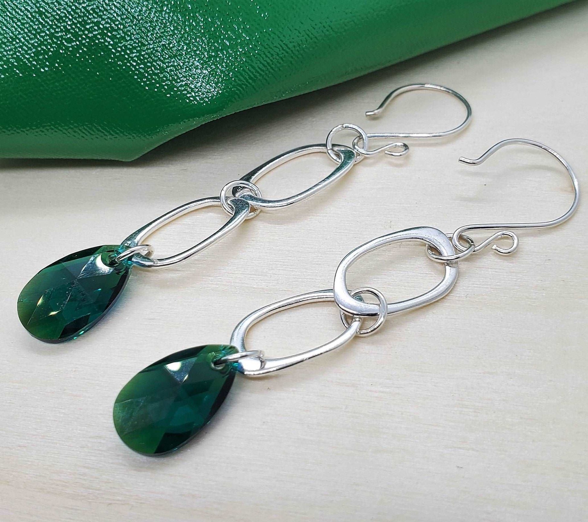 Close up earring photography, earrings for wormen, Emerald Shimmer Dangle Earrings, handmade by Jiana Deon