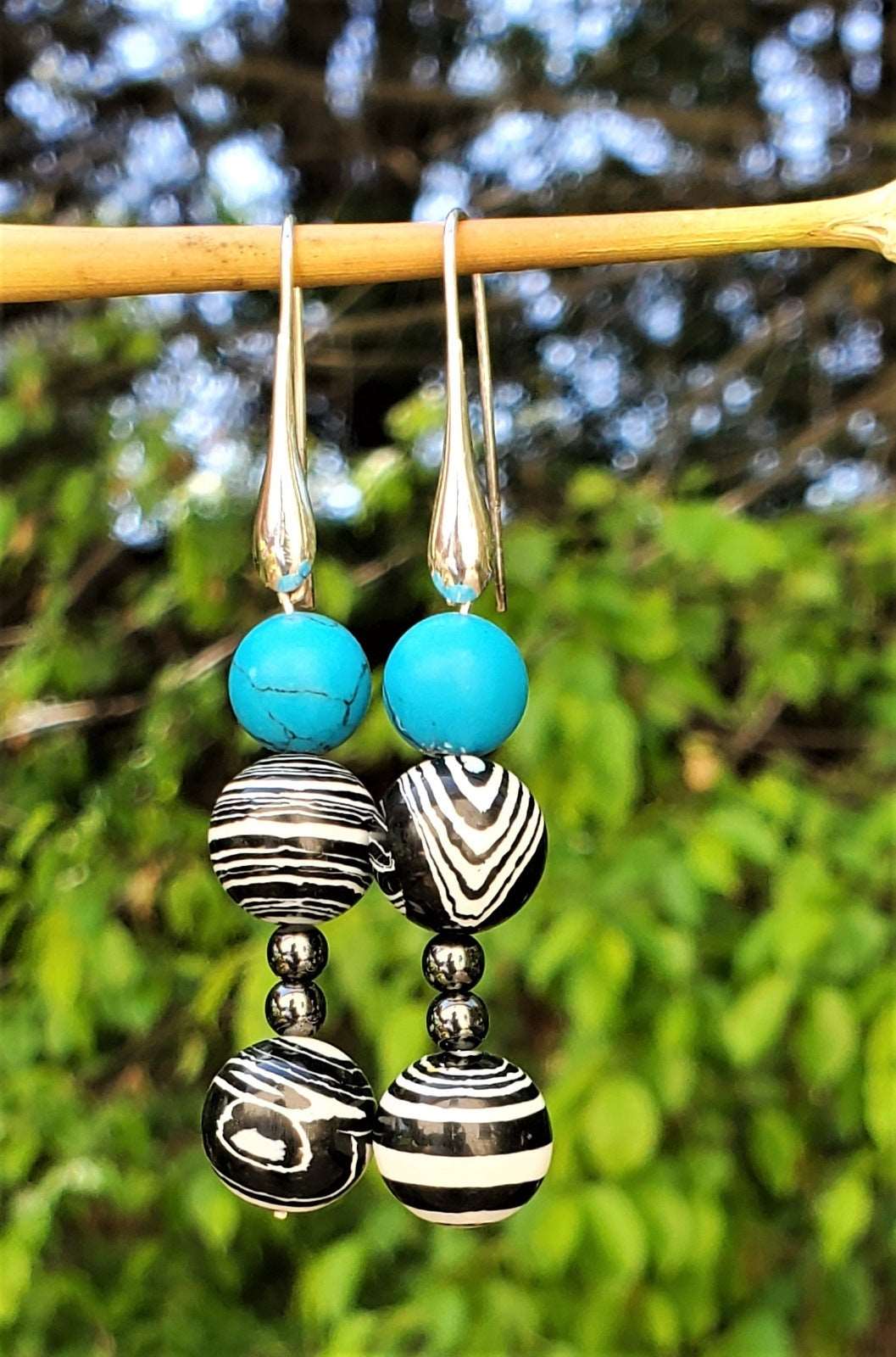 Photo of earrings outside view, beautiful earrings, earrings for women, handmade earrings, Robin Dangle Earrings